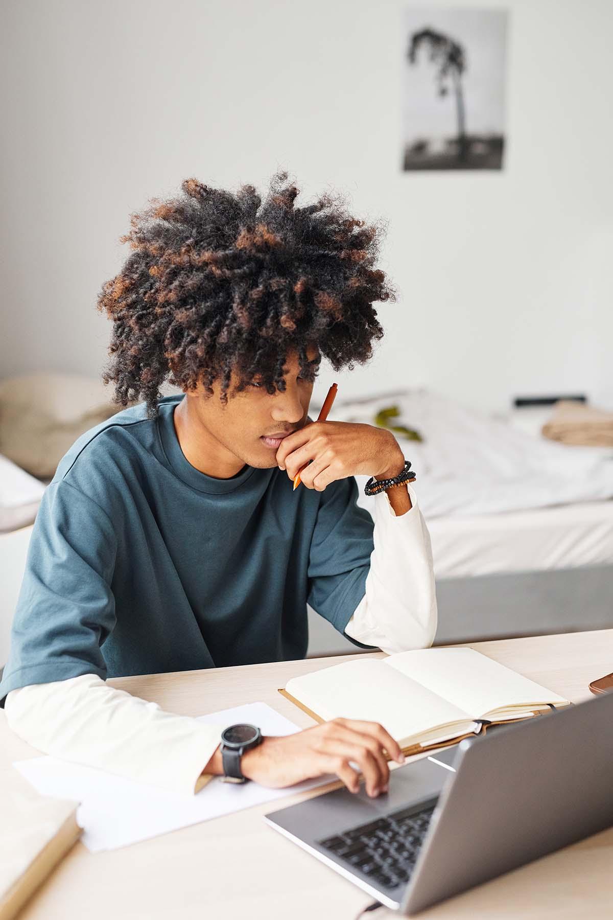 Student studying online with CAC